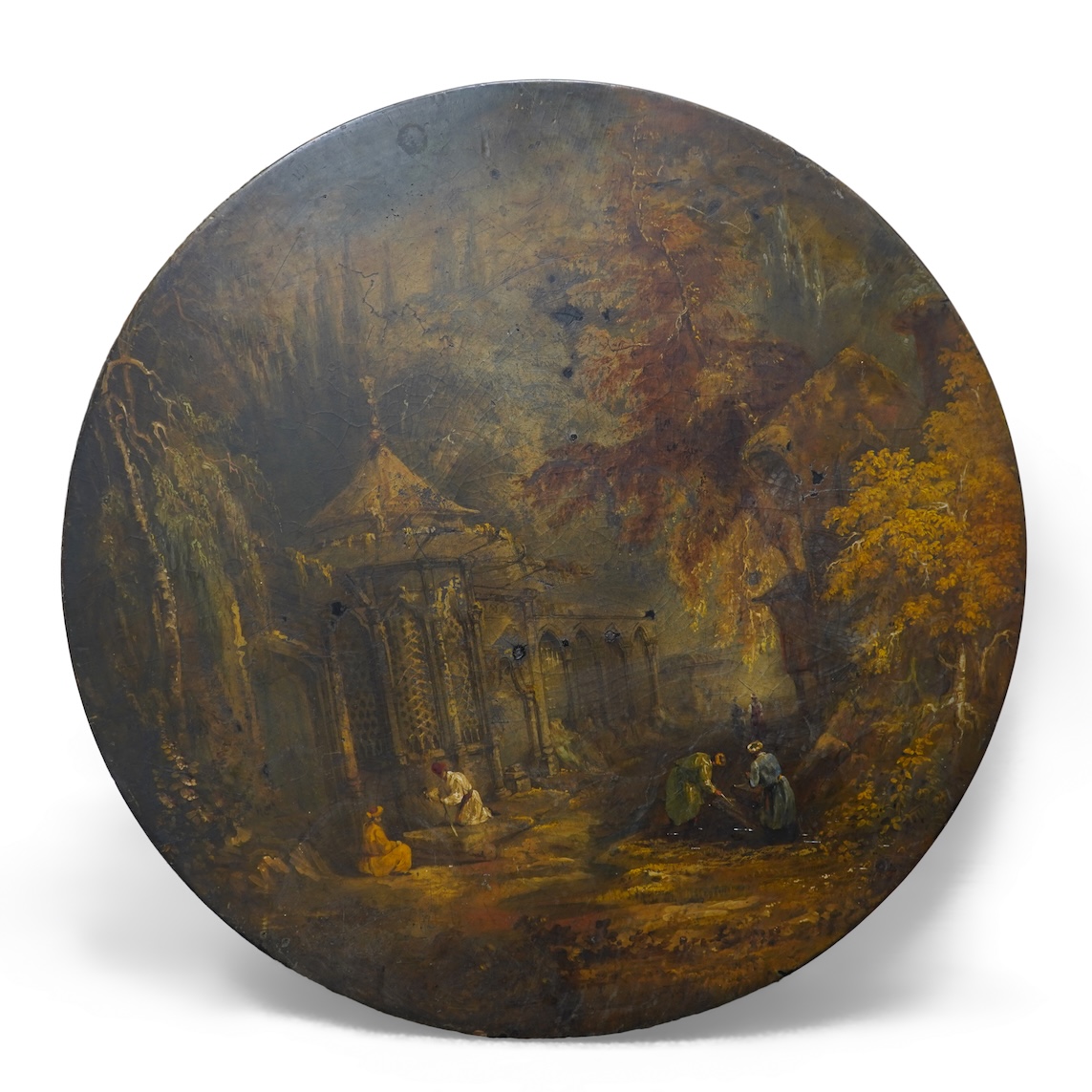 A Victorian japanned table top, depicting Indian grave robbers